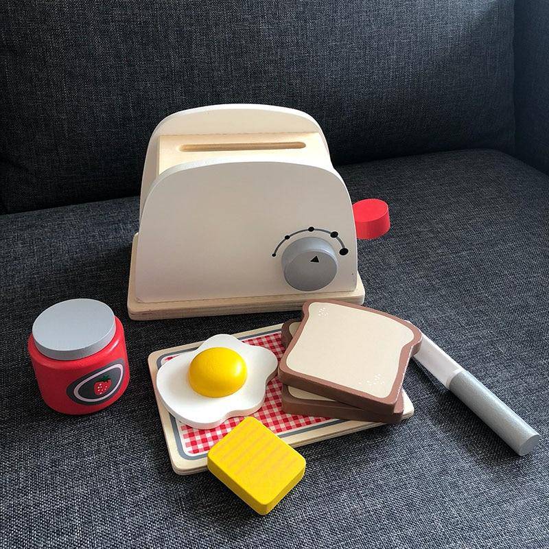 https://woodenpuzzletoys.com/cdn/shop/products/food-kids-wooden-pretend-play-sets-pretend-waffle-toaster-bread-maker-coffee-machine-toy-27965800972370_800x.jpg?v=1638365473