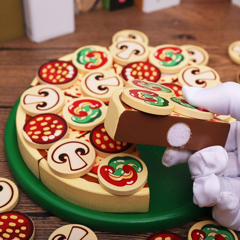 https://woodenpuzzletoys.com/cdn/shop/products/food-pizza-wooden-toys-food-cooking-simulation-children-kitchen-pretend-play-27965799596114_800x.jpg?v=1638365424