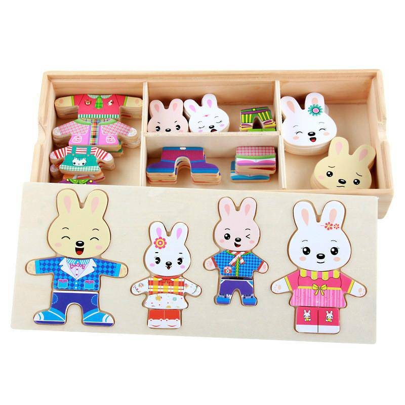 https://woodenpuzzletoys.com/cdn/shop/products/kiddies-4-5-6-four-small-rabbits-wooden-bear-or-rabbit-family-change-clothes-toys-28551169933394_800x.jpg?v=1638361142
